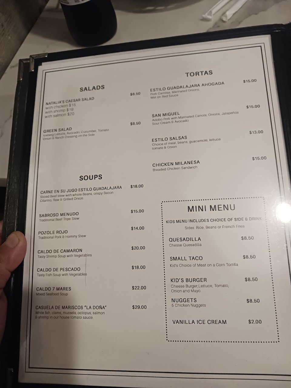 Menu page with tacos, dips, and appetizers.